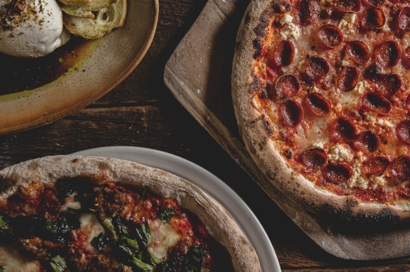 thin crust pizza and mozzarella handcrafted by Baci Restorante
