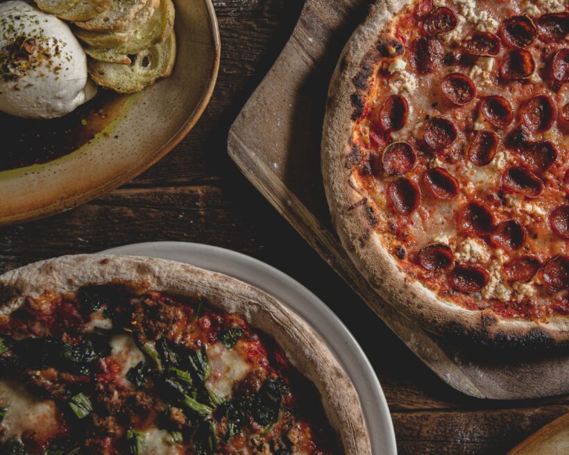 thin crust pizza and mozzarella handcrafted by Baci Restorante