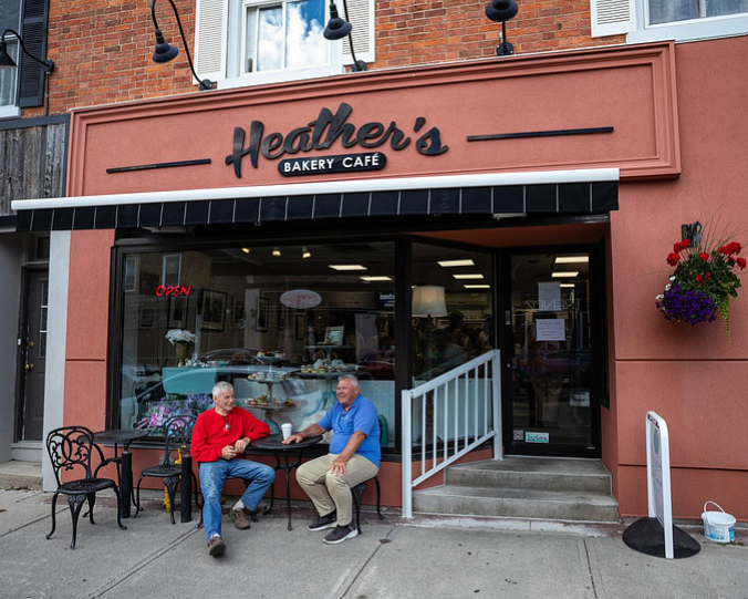 OPERATOR-HEATHERS-CAFE-GEORGETOWN Two people enjoying coffee outside Heathers Cafe