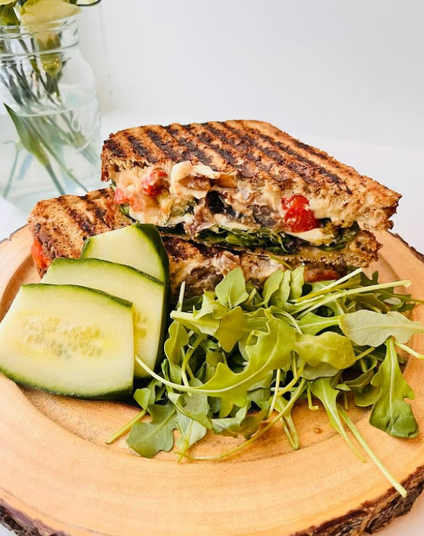 A freshly made sandwhich and salad from Silver Creek Social Haus