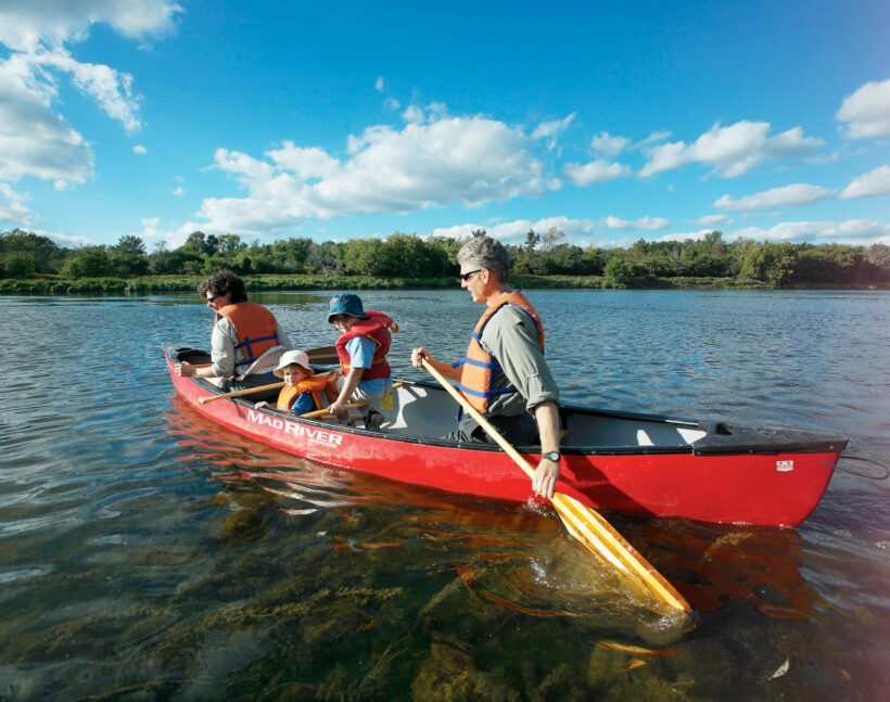 Family canoeing on the Grand River